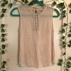 White sleeveless blouse